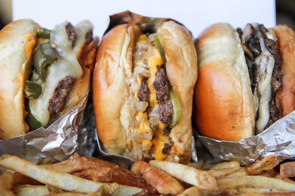 From left to right, a spicy smash burger, classic smash burger and truffle smash burger are available at SmashCity Knoxville, now located in the former OliBea on South Central Street. The restaurant started as a food truck and was among the original vendors at Knoxville's first food hall, Marble City Market.