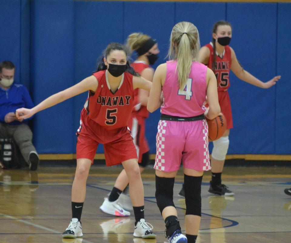 Onaway's Madilyn Crull (5) defends Inland Lakes' Christy Shank (4) during a girls basketball matchup from last season. Crull is another experienced player back for the Onaway girls basketball team this season.