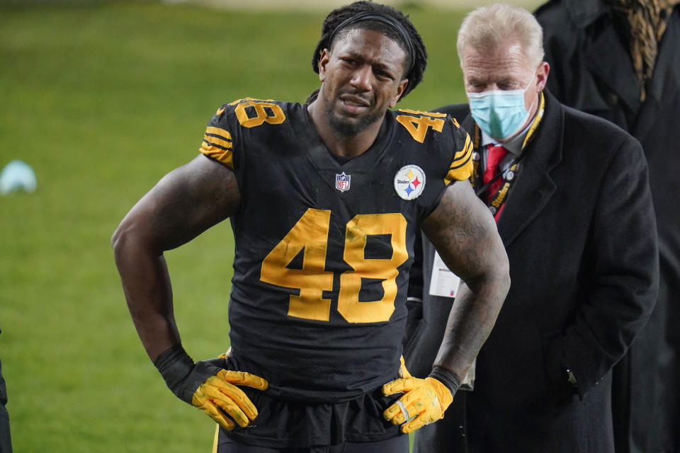 Pittsburgh Steelers outside linebacker Bud Dupree grimaces as walks on the sideline after being injured playing against the Baltimore Ravens during an NFL football game Wednesday, Dec. 2, 2020, in Pittsburgh. The Steelers won 19-14. (AP Photo/Gene J. Puskar)