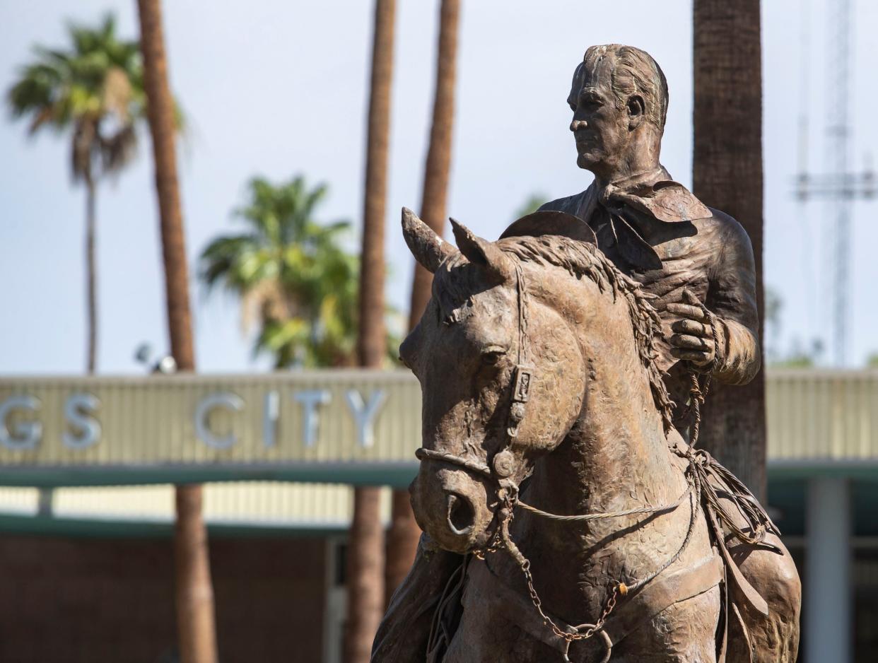 The statue depicting longtime Palm Springs Mayor Frank Bogert on horseback is seen in front of City Hall in Palm Springs, Calif., Friday, June 3, 2022.