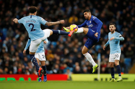 Soccer Football - Premier League - Manchester City v Chelsea - Etihad Stadium, Manchester, Britain - February 10, 2019 Manchester City's Kyle Walker in action with Chelsea's Emerson Palmieri Action Images via Reuters/Carl Recine