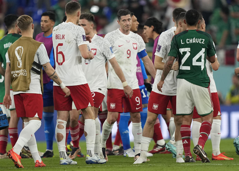 Poland's Robert Lewandowski looks disappointed after the World Cup group C soccer match between Mexico and Poland, at the Stadium 974 in Doha, Qatar, Tuesday, Nov. 22, 2022. (AP Photo/Martin Meissner)