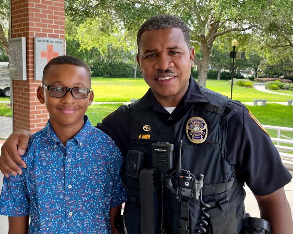Ronald Vann Jr. read aloud his winning essay on Sunday. There to support him was his dad, Ronald Sr., a sergeant with the Ocala Police Department.