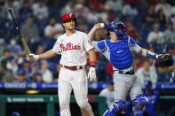 Philadelphia Phillies' J.T. Realmuto reacts after striking out against Los Angeles Dodgers pitcher Corey Knebel during the sixth inning of a baseball game, Tuesday, Aug. 10, 2021, in Philadelphia. (AP Photo/Matt Slocum)