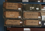 Boxes of laces and silks are pictured in the workshop of the hand fan-making museum in Paris, Wednesday, Jan. 20, 2021. Just like the leaves of its gilded fans, France's storied hand fan-making museum could fold up and vanish. The splendid Musee de l'Eventail in Paris, a classed historical monument, is the culture world's latest coronavirus victim. (AP Photo/Michel Euler)