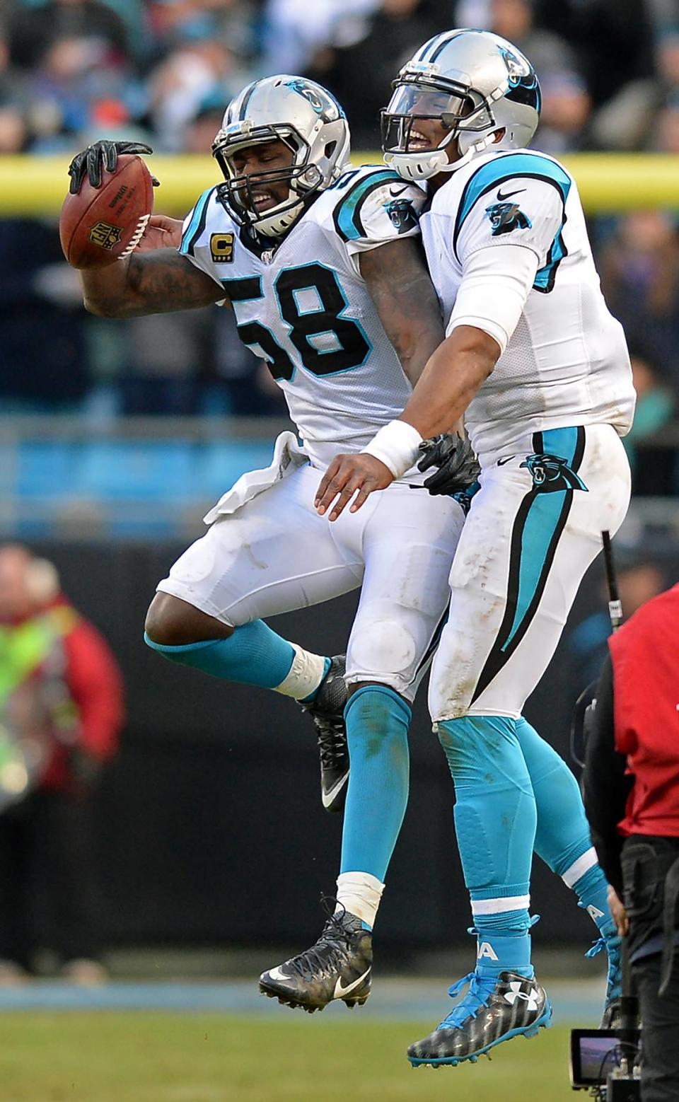 Carolina Panthers linebacker Thomas Davis, left, and quarterback Cam Newton celebrate Davis’s recovery of an onside kick against Seattle. The two were fierce rivals in practice. “If I won a rep against him or if we won a rep against them, I’m letting him hear about it. I’m letting him know every single time and vice versa,” Davis said of Newton. Jeff Siner/jsiner@charlotteobserver.com