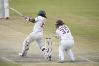 Zimbabwe batsman Chamu Chibhabha in action on the final day of the first Test cricket match between Zimbabwe and West Indies at Queens Sports Club in Bulawayo, Zimbabwe, Wednesday, Feb, 8, 2023. (AP Photo/Tsvangirayi Mukwazhi)