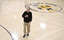 Saint Joseph coach Jim Calhoun walks off the court to the locker room at the end of the first half of the team's NCAA college basketball game against Pratt Institute, Friday, Jan. 10, 2020, in West Hartford, Conn. Now coaching Division III basketball with the same fire he stalked the sidelines at UConn, Calhoun is reaching his 900th win as a college coach. (AP Photo/Jessica Hill)