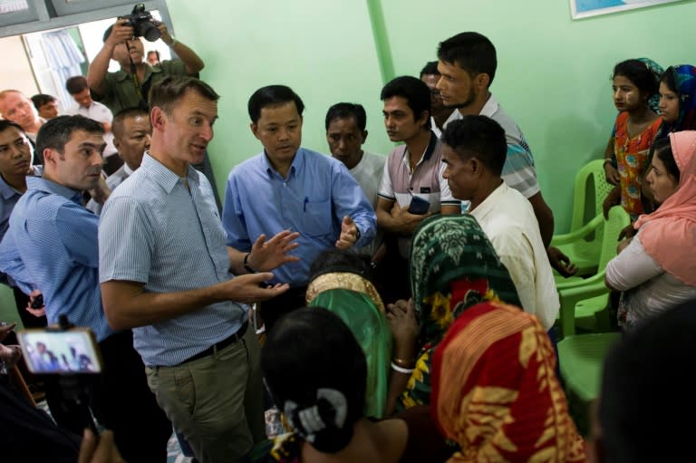 British foreign minister Jeremy Hunt meets local residents in Rakhine state. He was led on a three-hour, tightly-managed tour of Rakhine via helicopter
