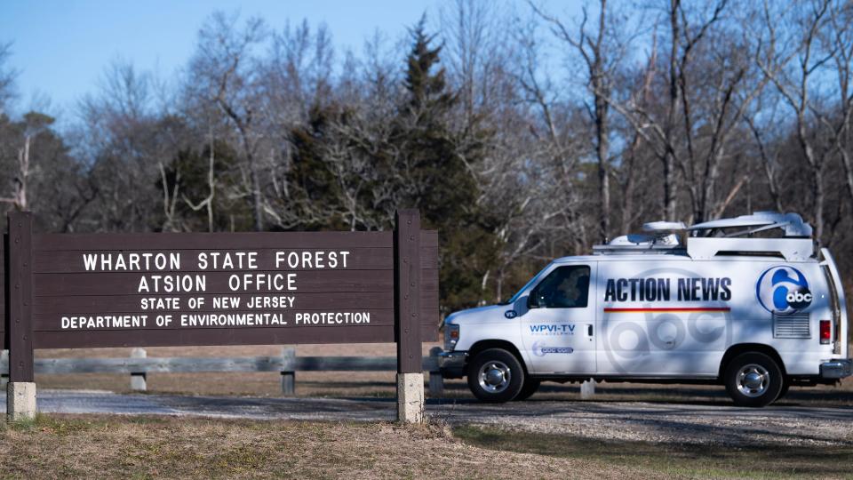 An Action News van exits the parking lot of the Wharton State Forest Atsion office on Wednesday December 20, 2023 after a pilot and a photographer were killed when Action News' helicopter Chopper 6 crashed in a wooded area of Burlington County, New Jersey, on Tuesday night.