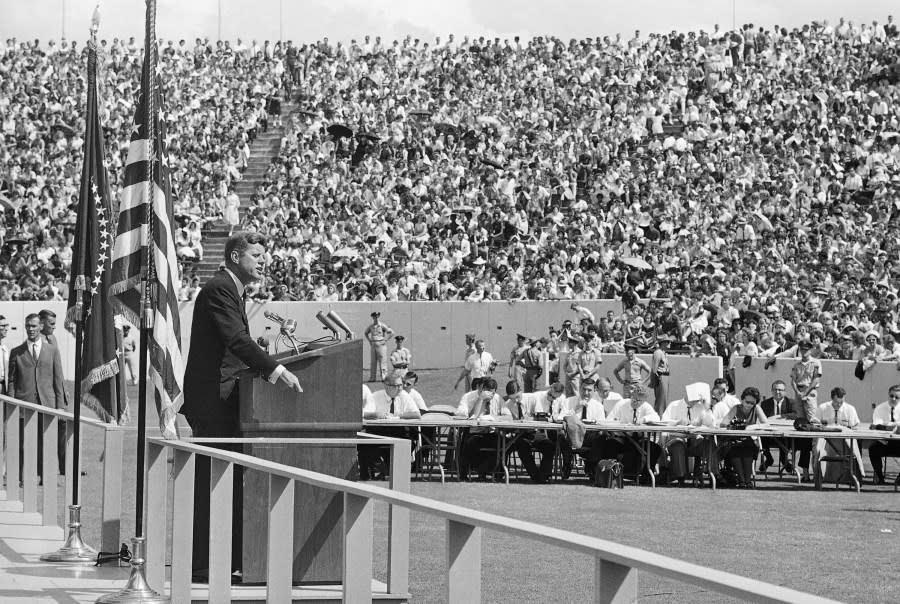 President John F. Kennedy delivers an address to approximately 50,000 people at Rice University stadium in Houston during his tour of NASA installations throughout the country, Sept. 12, 1962. The President promised that outer space will not be filled with weapons of mass destruction. (AP Photo)