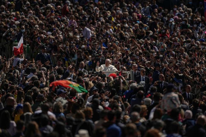 Pope Francis on his popemobile drives through the crowd of faithful at the end of the Catholic Easter Sunday mass on April 17, 2022. Pope Francis has said the Catholic Church takes such a tough stance against abortion &quot;because if you accept this, you accept homicide daily.&quot;
