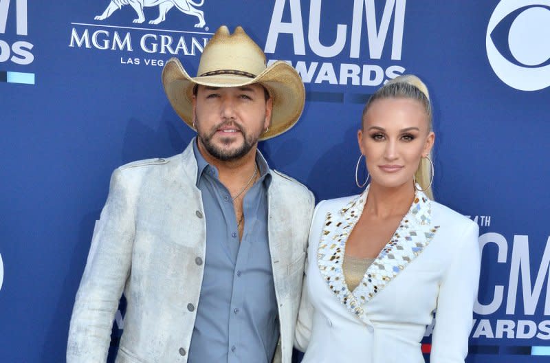 Jason Aldean (L) and Brittany Aldean attend the Academy of Country Music Awards in 2019. File Photo by Jim Ruymen/UPI