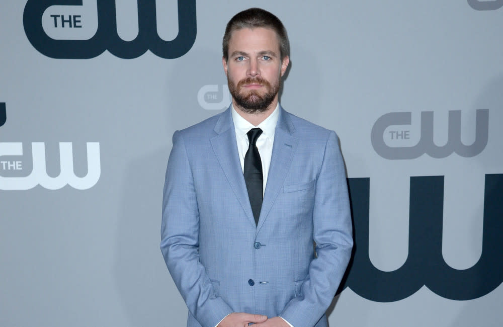 Stephen Amell and Cassandra Jean 'welcome second child' credit:Bang Showbiz