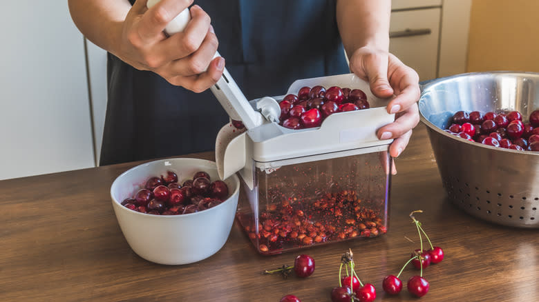 Pitting cherries with cherry pitter