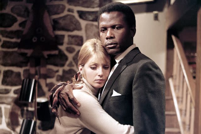 <p>Universal/Kobal/Shutterstock</p> Sidney Poitier and Joanna Shimkus Poitier in 1969's 'The Lost Man'