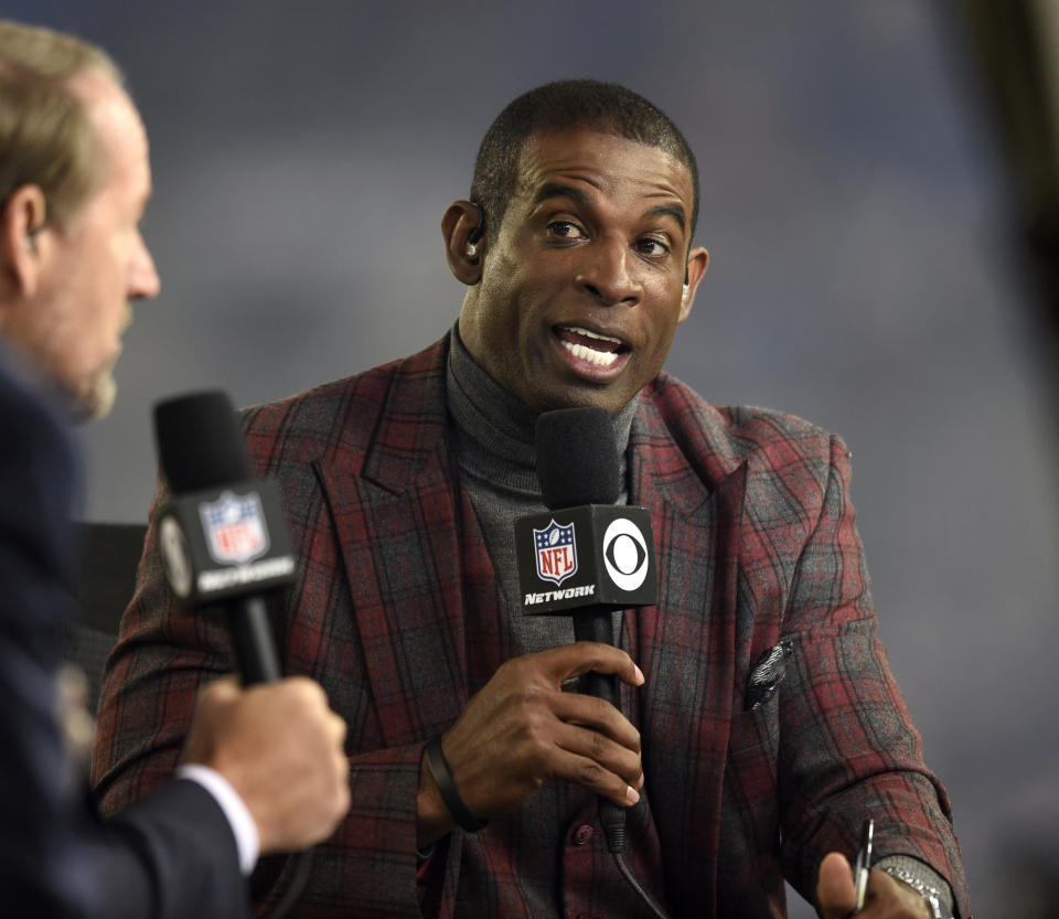 FILE - In this Oct. 26, 2017, file photo, Deion Sanders speaks on the Thursday Night Football set during halftime in an NFL football game between the Baltimore Ravens and the Miami Dolphins, in Baltimore. The NFL launched a casting call Sunday, Nov. 17, 2019, looking for the next generation of youth football stars to help usher in its second century. In a spot launching "The Next 100 Super Bowl Contest," Sanders calls for parents and youth coaches to send in videos showcasing their kids' best moves and highlighting their passion for America's most popular sport. Boys and girls ages 9-12 will get a chance to attend Super Bowl 54 in Miami and to appear in a follow-up commercial to last year's epic star-studded banquet spot that kicked off the league's 100th season. (AP Photo/Gail Burton, File)