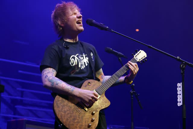 <p>Simone Joyner/Getty </p> Ed Sheeran performs a surprise set for rock band The Darkness in December 2023 in London