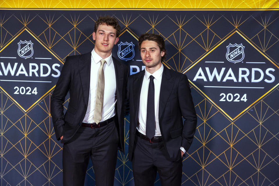 Quinn and Luke Hughes arrive for hockey's NHL Awards, Thursday, June 27, 2024, in Las Vegas. (AP Photo/L.E. Baskow)