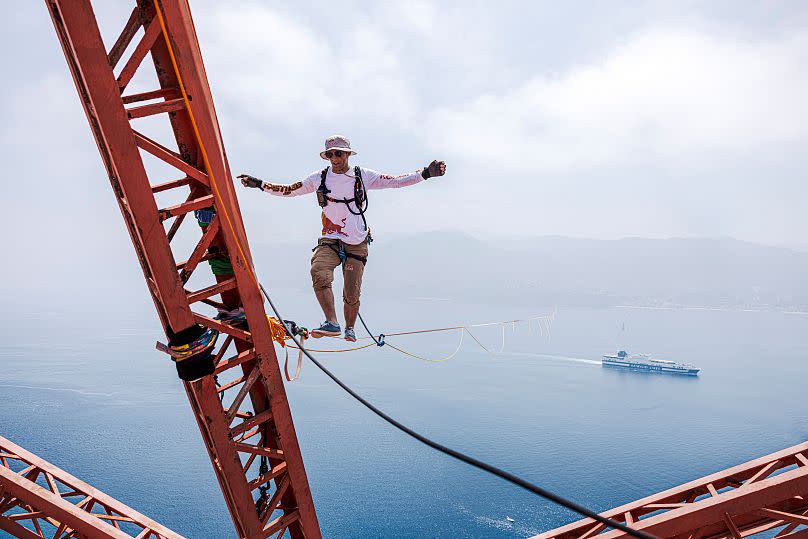 Jaan's slackline - a strip of webbed fabric - measured just 1.9 cm wide