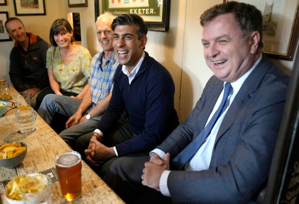 Rishi Sunak and Work and Pensions Secretary Mel Stride (Aaron Chown/PA Wire)