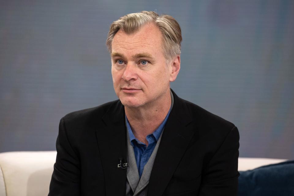 Christopher Nolan in a dark jacket