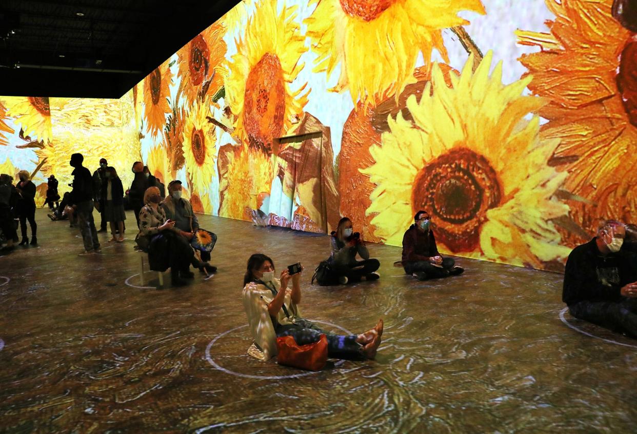 "Sunflowers" seem to come to life at the exhibit.