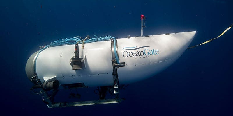 A side view of the Titan submersible in water.