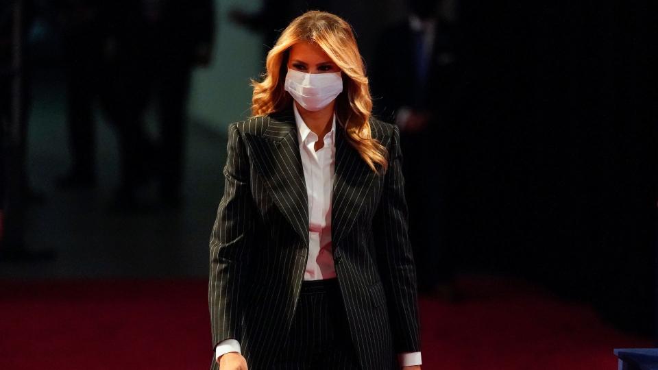 Mandatory Credit: Photo by Julio Cortez/AP/Shutterstock (10832193a)First lady Melania Trump, wearing a facemask, walks towards her seat for the during the first presidential debate, at Case Western University and Cleveland Clinic, in Cleveland, Ohio.