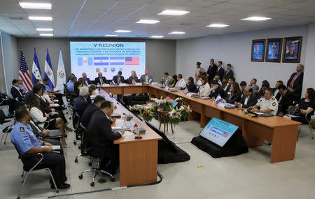 U.S. Secretary of Homeland Security Kirstjen Nielsen, Honduras' President Juan Orlando Hernandez and officials representing the governments of Guatemala, Honduras, and El Salvador attend a multilateral meeting at the Honduran Ministry of Security in Tegucigalpa, Honduras March 27, 2019. REUTERS/Jorge Cabrera