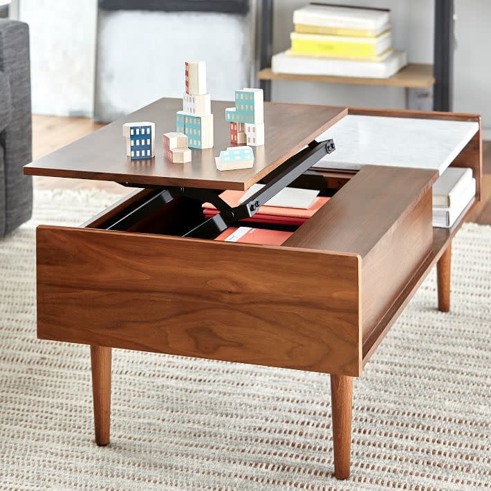 <p><a href="https://go.redirectingat.com?id=74968X1596630&url=https%3A%2F%2Fwww.westelm.com%2Fproducts%2Fmid-century-pop-up-storage-coffee-table-h1903&sref=https%3A%2F%2Fwww.housebeautiful.com%2Froom-decorating%2Fliving-family-rooms%2Fg3164%2Fcoffee-table-storage%2F" rel="nofollow noopener" target="_blank" data-ylk="slk:Shop Now;elm:context_link;itc:0;sec:content-canvas" class="link ">Shop Now</a></p><p>Pop-Up Storage Coffee Table</p><p>westelm.com</p><p>$799.00</p>