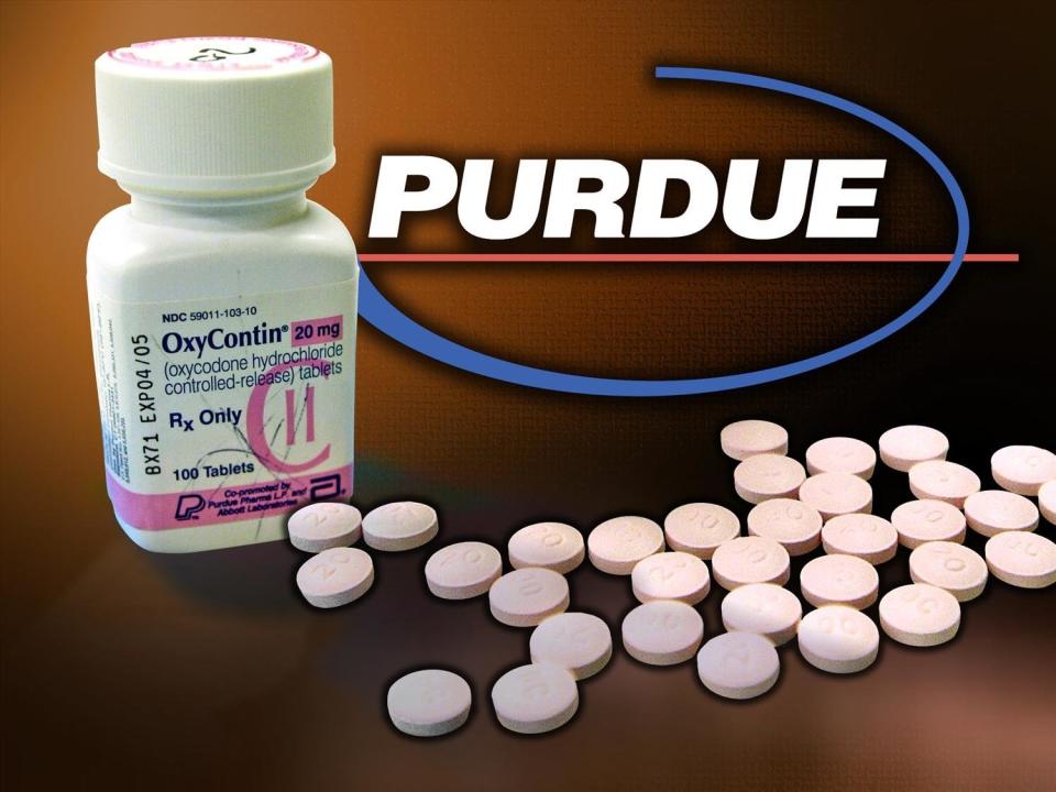 PURDUE Pharma logo over OxyContin bottle and tablets, partial graphic