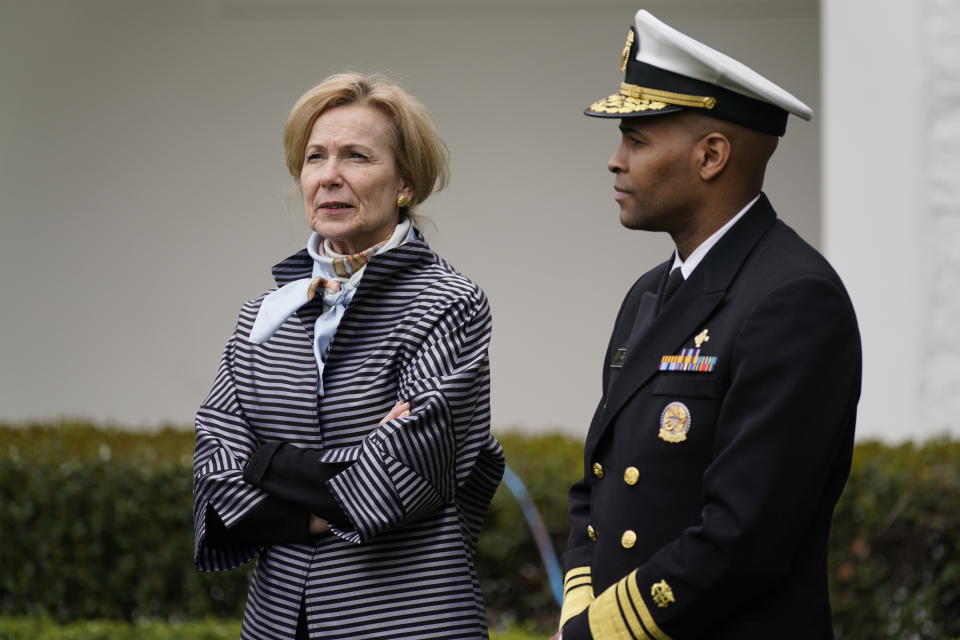Dr. Deborah Birx, White House coronavirus response coordinator and Surgeon General Jerome Adams arrive for a Fox News Channel virtual town hall at the White House, Tuesday, March 24, 2020, in Washington. (AP Photo/Evan Vucci)