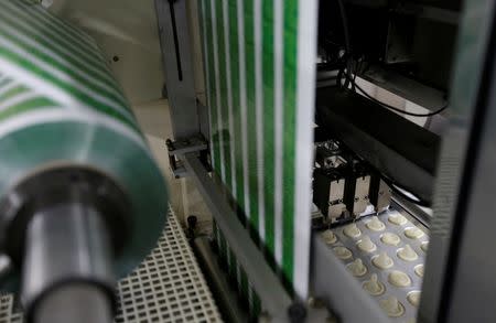 Condoms, produced with natural rubber extracted from the Seringueira tree, are seen at the Natex male condoms plant in Xapuri, Acre state, Brazil, June 23, 2016. REUTERS/Ricardo Moraes