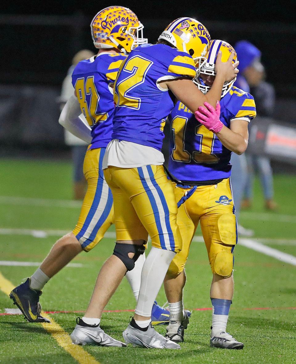 RB John Gianibas gets props from QB Luke Richardson.The Hull Pirates play their first round in the MIAA tournament against the Narragansett Warriors at home on Friday November 4, 2022.