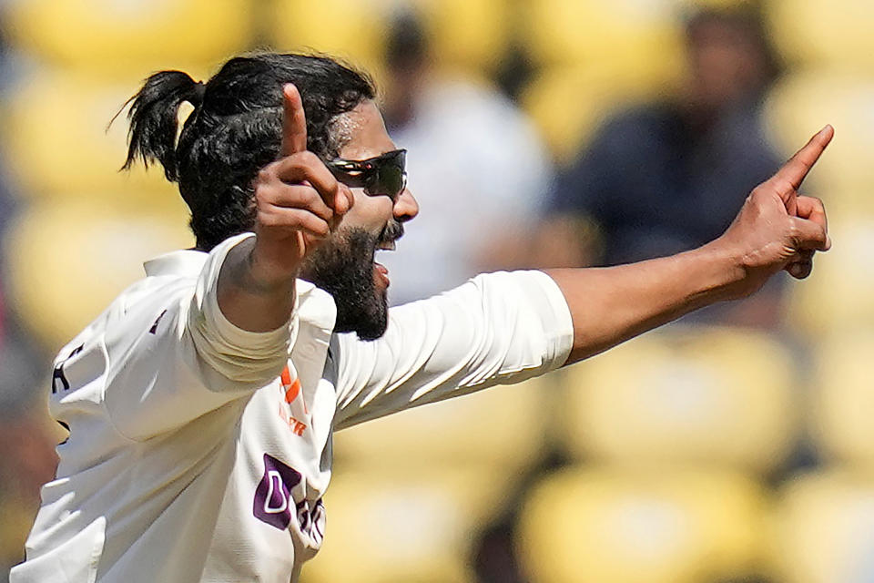 India's Ravindra Jadeja celebrates the dismissal of Australia's Steve Smith during the first day of the first cricket test match between India and Australia in Nagpur, India, Thursday, Feb. 9, 2023. (AP Photo/Rafiq Maqbool)