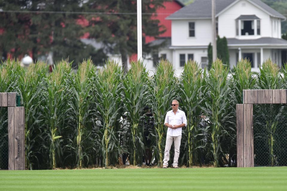 Actor Kevin Costner walks onto the field before a game between the Chicago White Sox and the New York Yankees at Field of Dreams in Dyersville on Aug. 12, 2021.