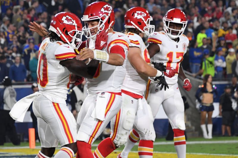 Miami Dolphins wide receiver Tyreek Hill (L) will compete against former teammate Patrick Mahomes (C) and the Kansas City Chiefs on Sunday in Frankfurt, Germany. File Photo by Jon SooHoo/UPI