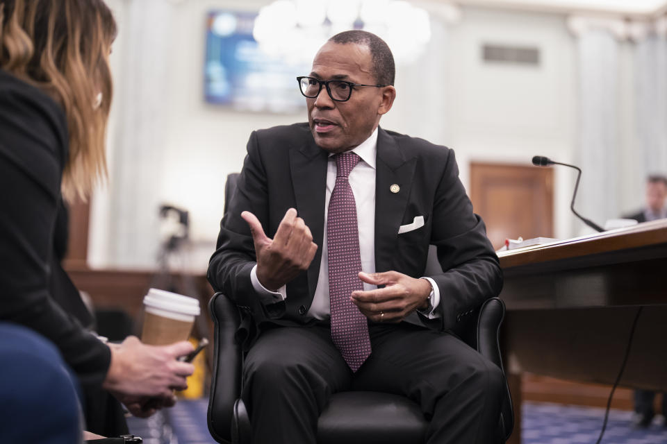 Acting Administrator of the Federal Aviation Administration Billy Nolen confers with his staff before testifying at the Senate Commerce, Science, and Transportation Committee as the panel examines recent failures in the FAA's NOTAM system, at the Capitol in Washington, Wednesday, Feb. 15, 2023. (AP Photo/J. Scott Applewhite)