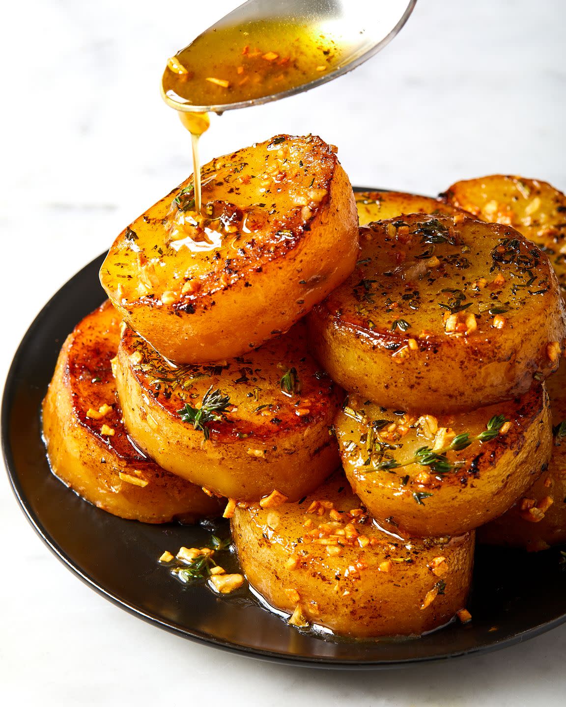 melting potatoes with herbs