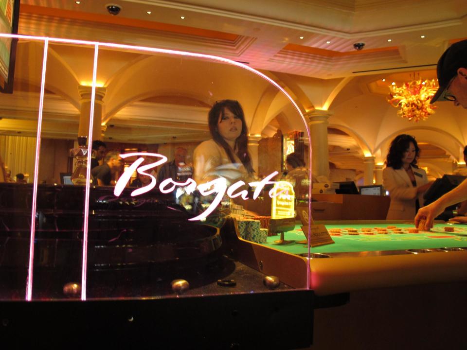 In this June 6, 2013, photo, a dealer waits as a gambler places chips on a roulette table at the Borgata Hotel Casino & Spa in Atlantic City N.J. The Borgata has its 10th anniversary on July 2, 2013. (AP Photo/Wayne Parry)