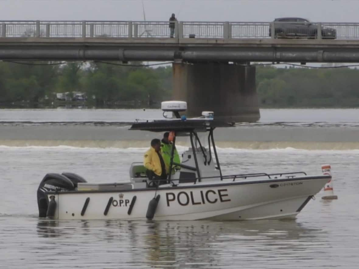 Police search the Grand River in Dunnville, Ont., in May.  (CBC News - image credit)