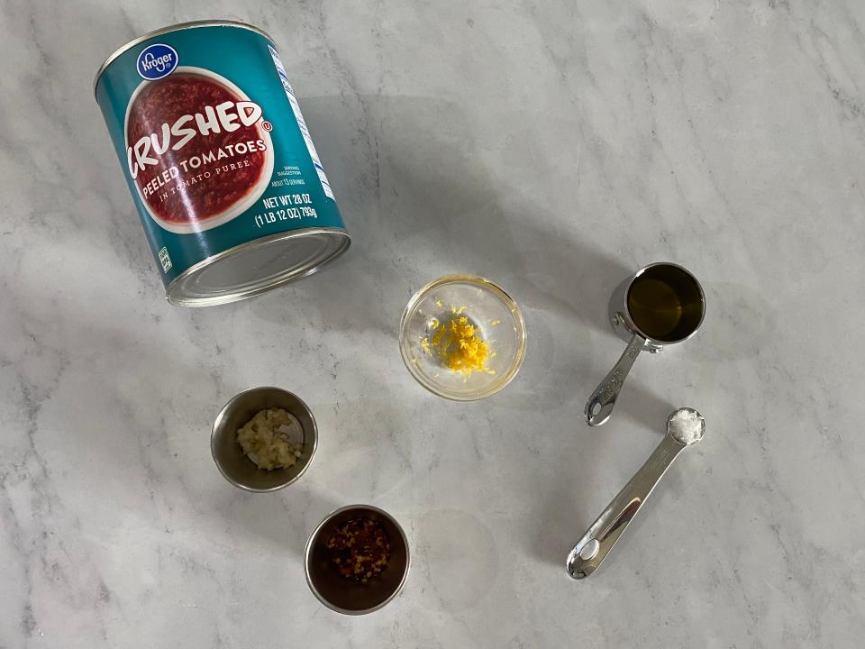 ingredients for 5 minute marinara on a counter