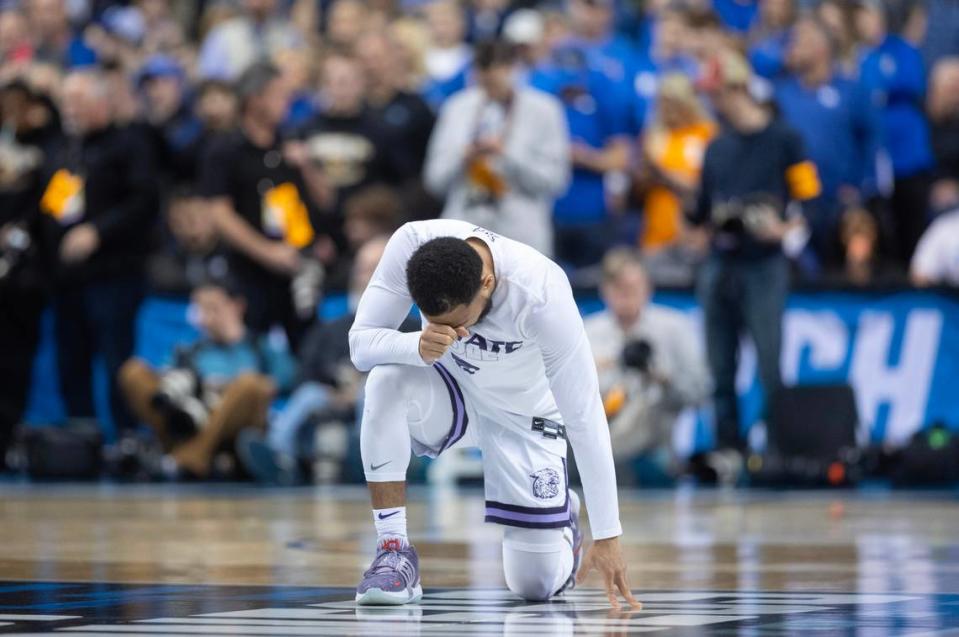 Kansas State’s Markquis Nowell pray before his team’s game against Kentucky in the second round NCAA Tournament game in Greensboro, NC on Sunday.