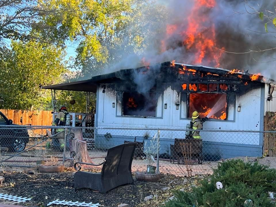 A family evacuated safely on Sunday as fire swept through their mobile home located at Hesperia Mobile Estates off Arrowhead Lake Road.