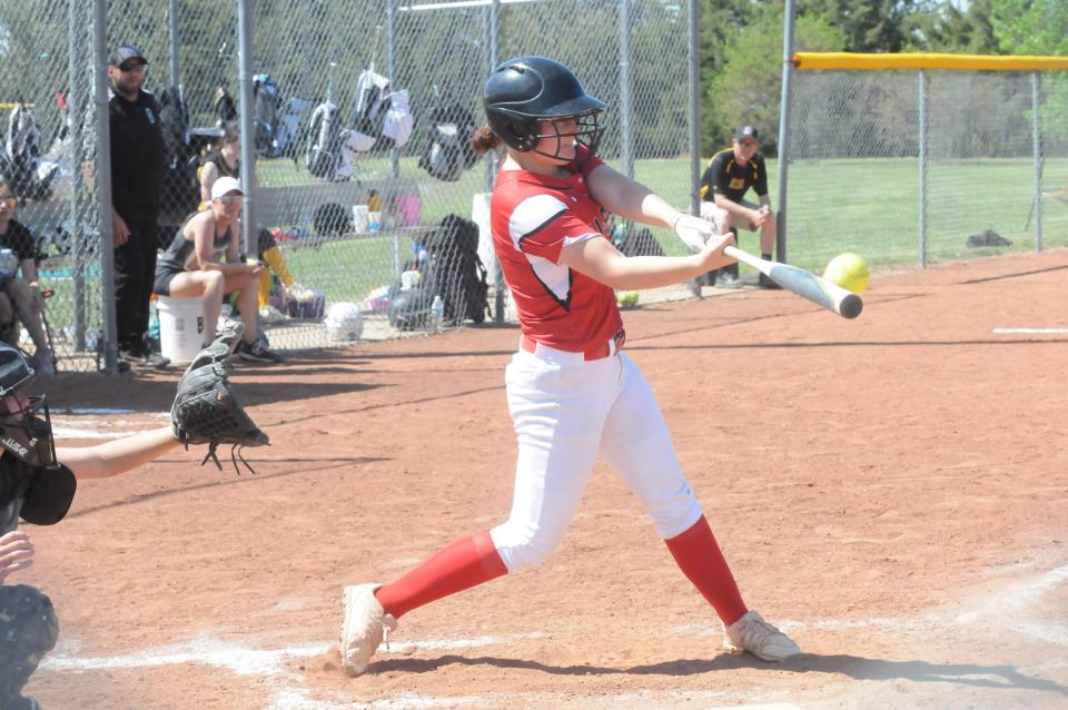 Ell-Saline's Raynee Hardesty (23) swings at a pitch during a doubleheader against Bennington Tuesday, May 10, 2022 at Bennington Sports Complex.