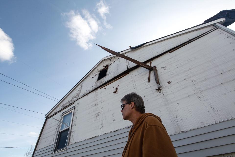 A board pierced the side of Steve Griffin's residence at Overlook Mutual Homes in Riverside. Right after the tornado, the house 