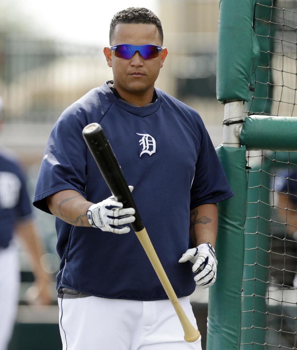 Detroit Tigers first baseman Miguel Cabrera prepares for batting practice before a spring exhibition baseball game against the Tampa Bay Rays in Lakeland, Fla., Friday, March 28, 2014. (AP Photo/Carlos Osorio)