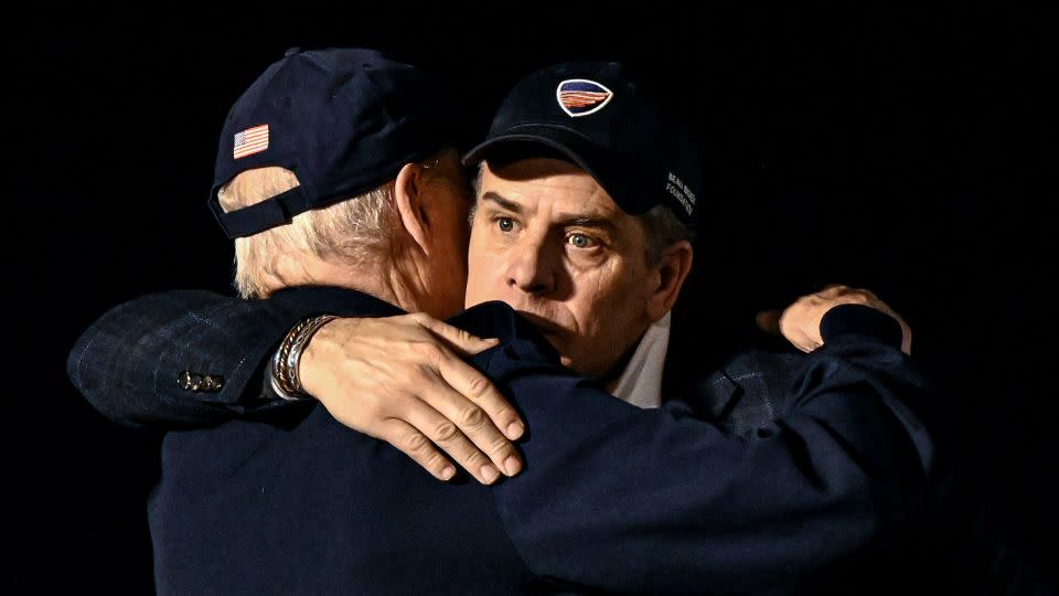President Joe Biden hugs his son Hunter Biden upon returning from a trip to Ireland, at Dover Air Force Base, in Delaware, on April 14.  - Kenny Holston/The New York Times/Redux