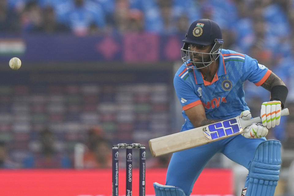 India's Suryakumar Yadav plays a shot during the ICC Men's Cricket World Cup final match between Australia and India in Ahmedabad, India, Sunday, Nov.19, 2023. (AP Photo/Mahesh Kumar A.)